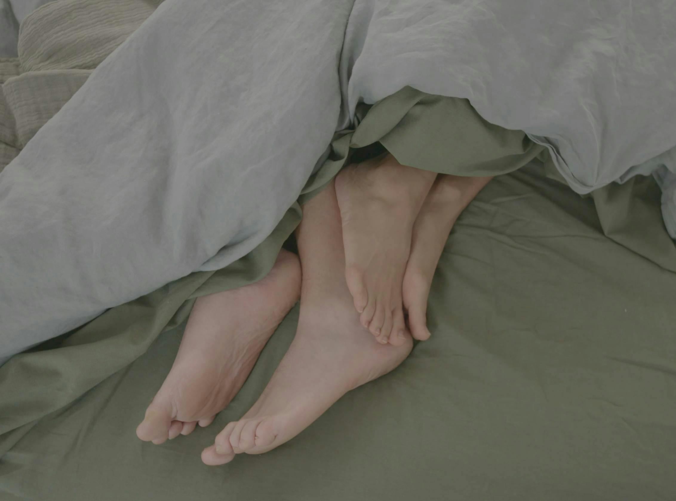 feet touching under sheets
